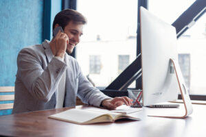 man sitting at desk